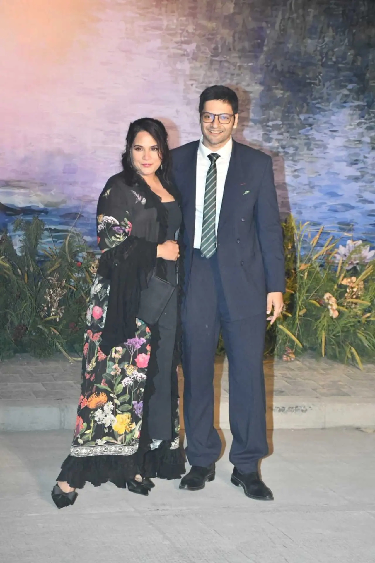 Richa Chadha looked effortlessly chic in a black suit adorned with delicate floral embroidery at the hemline. Ali Fazal complemented her perfectly with a sharp, formal look, making them a coordinated and classy pair.